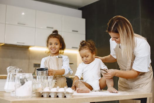 toddler helping in the kitchen